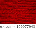 Handmade knitted background with detail wool threads. 109077943