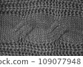 Handmade knitted background with macro weave threads. 109077948
