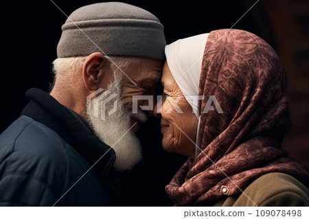 Muslim eldery couple. Elderly man kiss forehead a elderly woman. 109078498