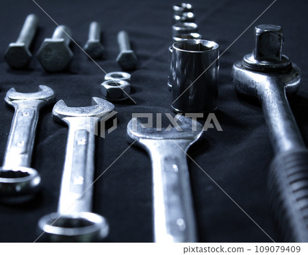 Bolts, Spanners And Socket Wrench Nozzles Isolated On Black Closeup Angle View 109079409