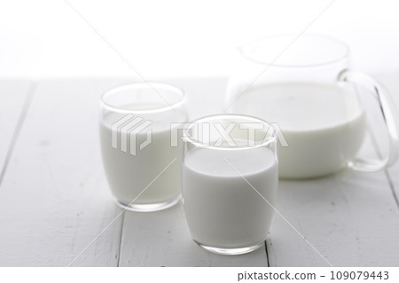 Drinking yogurt in glasses and pitchers 109079443