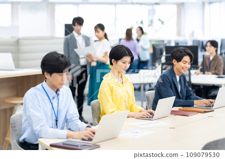 Young male and female engineers having a meeting in the office Young male and female engineers having a meeting in the office 109079530