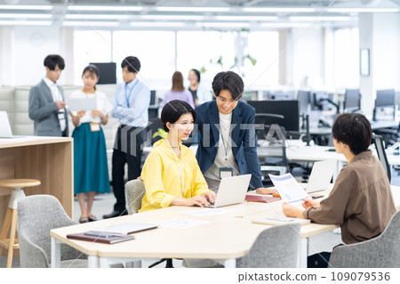 Young male and female engineers having a meeting in the office Young male and female engineers having a meeting in the office 109079536