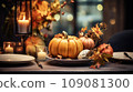 Thanksgiving table setting with pumpkin 109081300