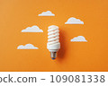 Light bulb with white cut out clouds. Idea concept 109081338