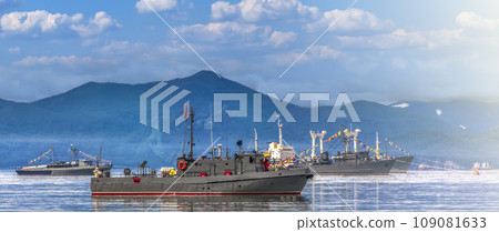 Warships in the maritime parade on bay on Pacific ocean on Kamchatka peninsula Warships in the maritime parade on bay on Pacific ocean on Kamchatka peninsula 109081633