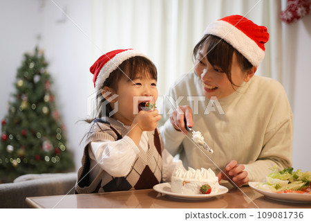 Parents and children eating Christmas image 109081736