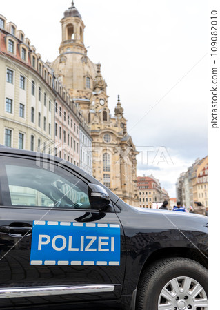 German Police black SUV car at Dresden Altstadt city street on New Market square Neumarkt for safety reasons at demonstration protest activists meeting. Armored policeman vehicle at Germany Saxony 109082010