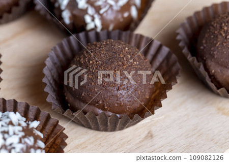 Cocoa and sugar chocolates, close up Cocoa and sugar chocolates, close up 109082126