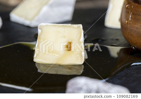 delicious soft cheese with white mold close-up 109082169