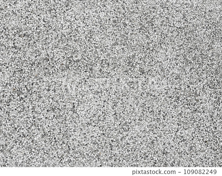 Horizontal background image 5 of the surface of washed concrete pavement with white, black, and gray pebbles standing out. Horizontal background image 5 of the surface of washed concrete pavement with white, black, and gray pebbles standing out. 109082249