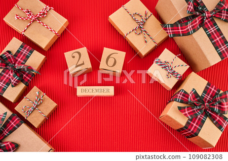 Boxing Day Concept. Different kinds of gift boxes on red background 109082308
