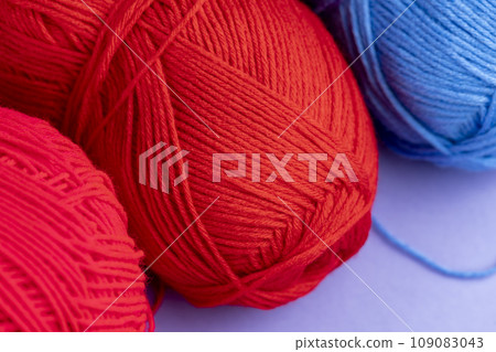 woolen threads of red color for knitting knitting close-up woolen threads of red color for knitting knitting close-up 109083043