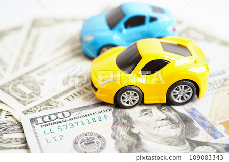 Bangkok, Thailand November 18, 2023 Car on banknote money, buying or insurance concept. Bangkok, Thailand November 18, 2023 Car on banknote money, buying or insurance concept. 109083343