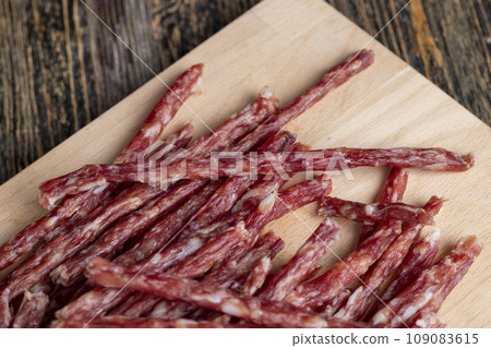 Thin pork sausage with spices Thin pork sausage with spices 109083615