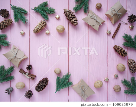 Christmas and New Year decorations on a wooden background Christmas and New Year decorations on a wooden background 109085979