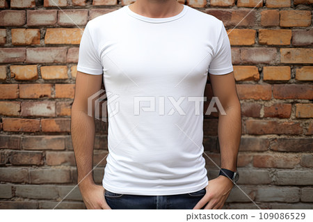Man wearing blank t-shirt. Brick wall background 109086529