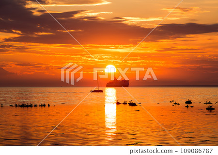 Cruise liner ship in sunset in sea 109086787