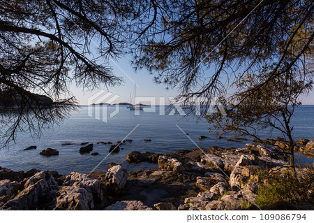 sunset and luxury yacht in the sea 109086794