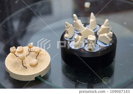 Fabrication of dental crowns and dentures made of ceramic. Scanning of plaster casts of teeth. Fabrication of ceramic dentures in a dental clinic. Ceramic dental crowns for implants. Fabrication of dental crowns and dentures made of ceramic. Scanning of plaster casts of teeth. Fabrication of ceramic dentures in a dental clinic. Ceramic dental crowns for implants. 109087183