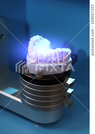 Fabrication of dental crowns and dentures made of ceramic. Scanning of plaster casts of teeth. Fabrication of ceramic dentures in a dental clinic. Ceramic dental crowns for implants. Fabrication of dental crowns and dentures made of ceramic. Scanning of plaster casts of teeth. Fabrication of ceramic dentures in a dental clinic. Ceramic dental crowns for implants. 109087203