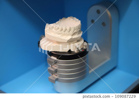 Fabrication of dental crowns and dentures made of ceramic. Scanning of plaster casts of teeth. Fabrication of ceramic dentures in a dental clinic. Ceramic dental crowns for implants. Fabrication of dental crowns and dentures made of ceramic. Scanning of plaster casts of teeth. Fabrication of ceramic dentures in a dental clinic. Ceramic dental crowns for implants. 109087229