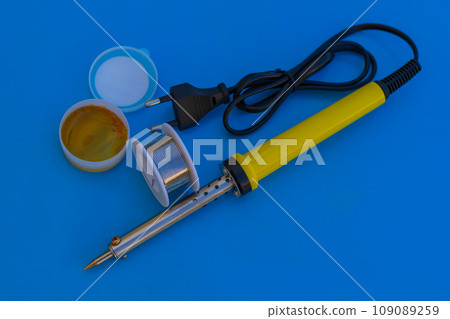 Soldering iron tool kit for repairing electrical devices by soldering tin, rosin, flux. Tools of companies providing services for the diagnosis and repair of electronic devices, also for DIY repairing Soldering iron tool kit for repairing electrical devices by soldering tin, rosin, flux. Tools of companies providing services for the diagnosis and repair of electronic devices, also for DIY repairing 109089259