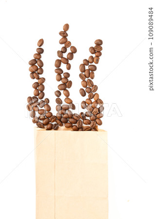 coffee poured from a brown package coffee poured from a brown package 109089484