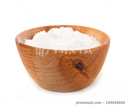 flour in a wooden platter 109089889