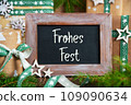 Text Frohes Fest, Means Happy Holidays, With Green Sustainable Winter Decor 109090634