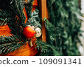 Christmas fir tree decorations with red and gold baubles. New Year celebration concept 109091341