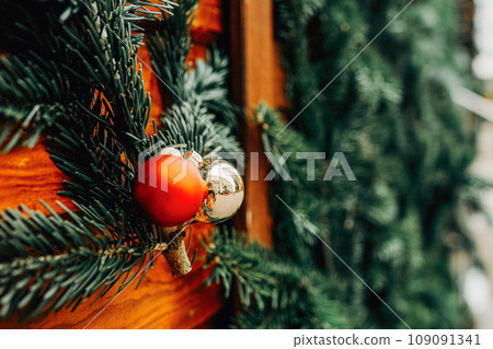 Christmas fir tree decorations with red and gold baubles. New Year celebration concept 109091341