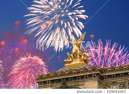 Fireworks over the Golden statue of Liberty on the roof of the Opera Garnier (Garnier Palace). Sculpted by Charles Gumery in 1869. Paris, France. UNESCO World Heritage Site Fireworks over the Golden statue of Liberty on the roof of the Opera Garnier (Garnier Palace). Sculpted by Charles Gumery in 1869. Paris, France. UNESCO World Heritage Site 109093065