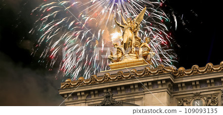 Fireworks over the Golden statue of Liberty on the roof of the Opera Garnier (Garnier Palace). Sculpted by Charles Gumery in 1869. Paris, France. UNESCO World Heritage Site Fireworks over the Golden statue of Liberty on the roof of the Opera Garnier (Garnier Palace). Sculpted by Charles Gumery in 1869. Paris, France. UNESCO World Heritage Site 109093135