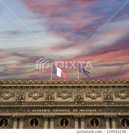 Opera Garnier (Garnier Palace) against the background of a beautiful sky at sunset, Paris, France. Translation Opera Garnier (Garnier Palace) against the background of a beautiful sky at sunset, Paris, France. Translation 109093246