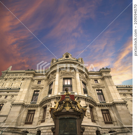 Opera Garnier (Garnier Palace)  against the background of a beautiful sky at sunset, Paris, France. Translation 109094070