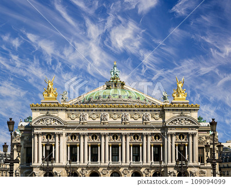 Opera Garnier (Garnier Palace) against the background of a beautiful sky with clouds, Paris, France. Translation Opera Garnier (Garnier Palace) against the background of a beautiful sky with clouds, Paris, France. Translation 109094099