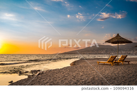 Sarande beach during sunset. Bistrica Beach with view at Sarande city. beautiful evening sky 109094316