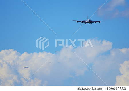 C-135 and C-17 landing at Yokota Air Base 109096880