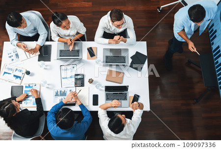 Analyst team utilizing BI Fintech to analyze financial data at table. Prudent Analyst team utilizing BI Fintech to analyze financial data at table. Prudent 109097336