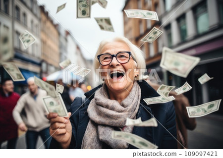 Happy person getting bonus money and banknotes flying in the air comeliness 109097421