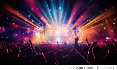 silhouette of concert crowd in front of bright stage lights 109097805