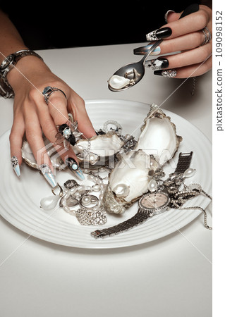 Creative design of nails on female hands. Art manicure. Creative design of nails on female hands. Art manicure. 109098152