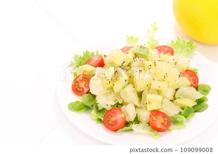 Tosa pomelo and avocado salad, bright background, large citrus fruits Tosa pomelo and avocado salad, bright background, large citrus fruits 109099008