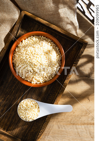 Sorghum rice on wood Sorghum rice on wood 109099965