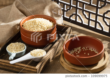 Sorghum rice on wood 109099975