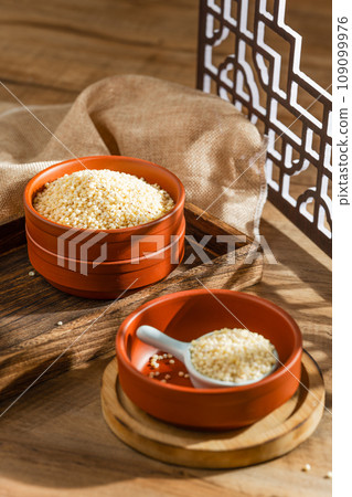 Sorghum rice on wood 109099976