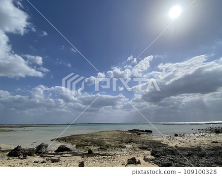 Ishigaki Island's sandy beach with many stones 109100328