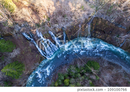 Drone photography | Aerial view of Shirahige Falls flowing into many strings | Biei River | Shirokane, Biei-cho, Hokkaido 109100766