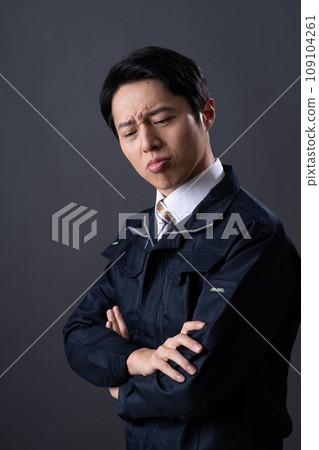 Middle-aged man in work clothes Middle-aged man in work clothes 109104261